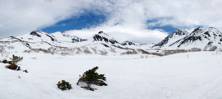 Panorama: winter rocky mountain landscape of Kamchatka Peninsula: beautiful view of snowy Mountain...