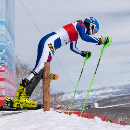 Mountain skier Shustrova Darya St. Petersburg. Russian Alpine Skiing Championship, International Ski Federation Championship, slalom. Moroznaya Mount, Kamchatka Peninsula, Russia - March 28, 2019のeditorial素材
