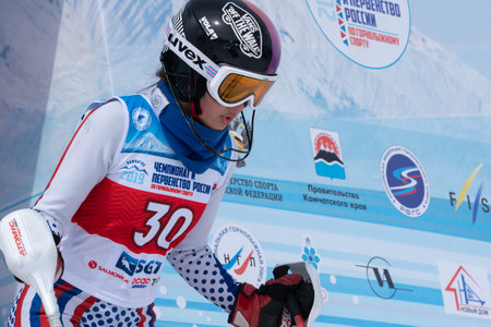 MOROZNAYA MOUNTAIN, KAMCHATKA PENINSULA, RUSSIA - MARCH 28, 2019: Mountain skier Vakhnina Anna Krasnoyarsk. Russian Alpine Skiing Championship, International Ski Federation Championship, slalom.のeditorial素材