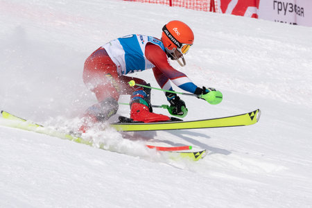 Mountain skier Vitaliy Shishkin Altai Region skiing down mount slope. Russian Alpine Skiing Cup, International Ski Federation Championship, slalom. Moroznaya Mount, Kamchatka, Russia - Mar 28, 2019のeditorial素材