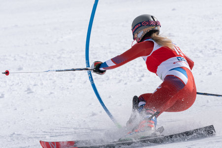 Slalom International Ski Federation Championship, Russian Alpine Skiing Cup. Mountain skier Kseniya Alopina Chelyabinsk Region skiing down mount ski slope. Kamchatka Peninsula, Russia - March 29, 2019のeditorial素材
