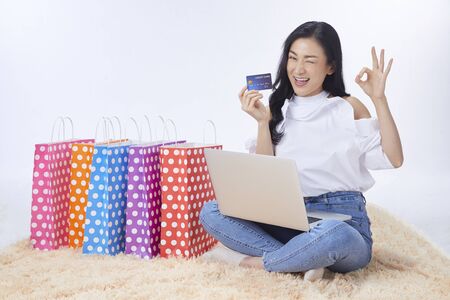 Young woman personal computer EC online shopping mail order shopping person material. Concept shopping onlineの写真素材
