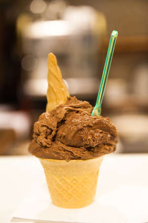 Close up image of chocolate ice cream coneの写真素材