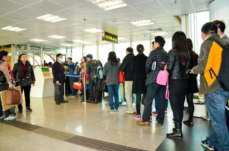 Hongkong,Hongkong - Jan 17,2014   Unidentified people waiting a boat for going to macau