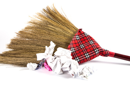 new broom sweeping  with many garbage