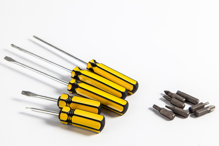 Interchangable screw tips in screwdrivers bit from steel  isolate on white background