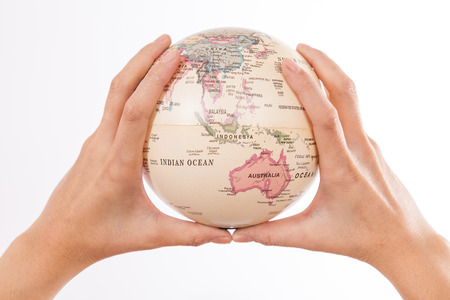 concept photography -- earth in handの写真素材