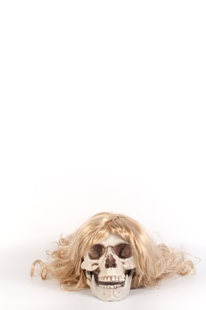 Wig of long blond hair isolated on whiteの写真素材