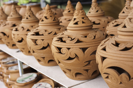 Carving clay,Thai traditional clay pottery, Selective Focus, Blur Background
