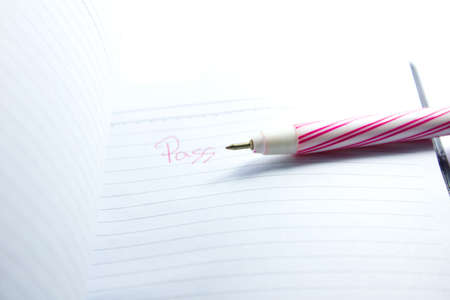 red pen note on papers pass
