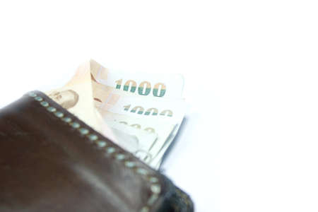 money pocket 1000 bath thailand on white backgroundの写真素材