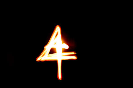 number 4 isolated on black background  Photography style freezelightの写真素材