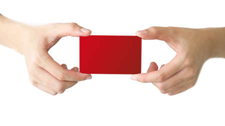 hand shows red card on white backgroundの写真素材