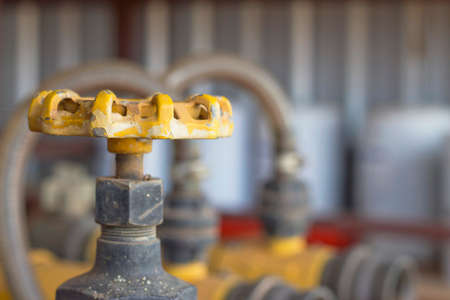 yellow hand wheel valve, close-up, industrial images の写真素材