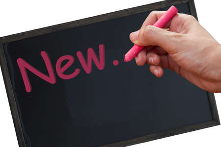  hand with chalk to write newの写真素材