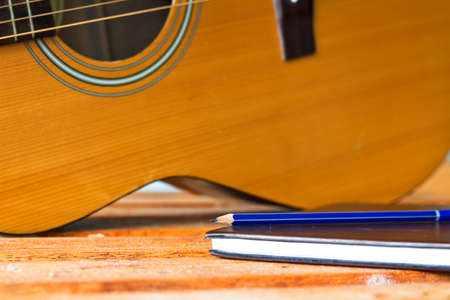 guitar and pencil for create music select focusの写真素材