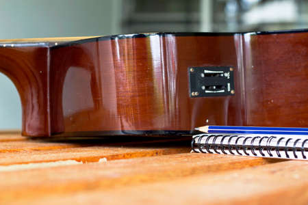 close up pencil on guitar for create music の写真素材