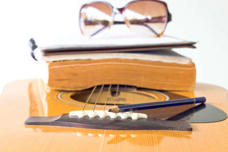 close up pencil on guitar for create music の写真素材