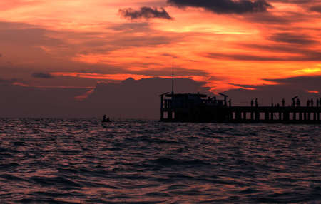 Bridge on sea silhouette photo