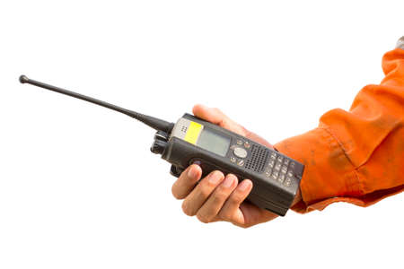 Hand hold walkie talkie white backgroundの写真素材