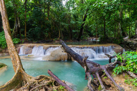 Waterfall in tropical forest at Erawan national park Kanchanaburi province, Thailandの写真素材