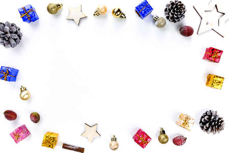 Christmas composition. Christmas gifts, pine branches, toys on white background. Flat lay, top view.の写真素材