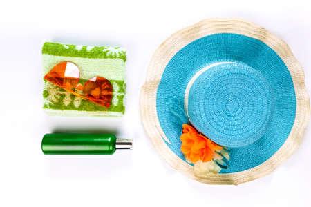Outfit and accessories of traveler on white background with copy space, Travel concept.Overhead view of Traveler's accessories, Essential vacation items, Travel concept on white background. top viewの写真素材