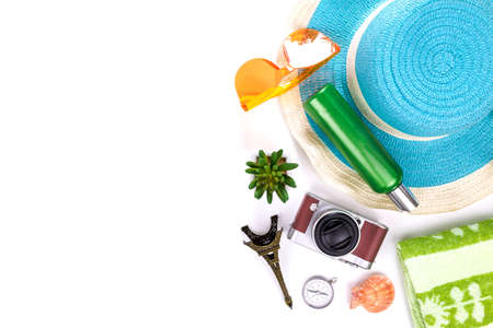Outfit and accessories of traveler on white background with copy space, Travel concept.Overhead view of Traveler's accessories, Essential vacation items, Travel concept on white background. top viewの写真素材