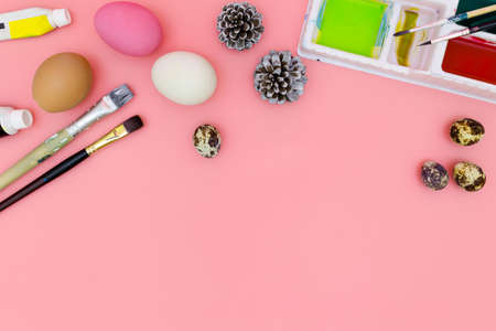 flat lay photo happy easter, top view of preparing for Easter on pink background, easter eggsの写真素材