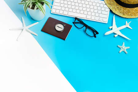 accessories of traveler on blue and white background with copy space, Travel concept, Overhead view of Traveler's accessories, Essential vacation items, Travel concept on blue and white background.の写真素材