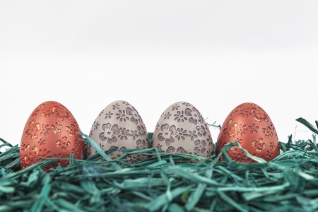 Easter eggs on green grass の写真素材