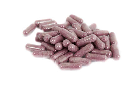 Many pills isolated on white backgroundの写真素材