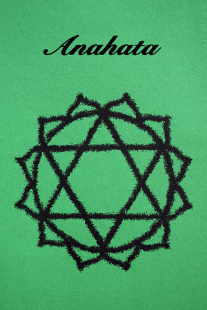 Anahata chakra.Isolated on green backgroundの写真素材