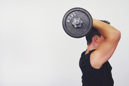 Working out with weightsの写真素材