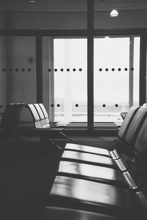 Empty airport terminal waiting area with chairs in Athens airportの写真素材