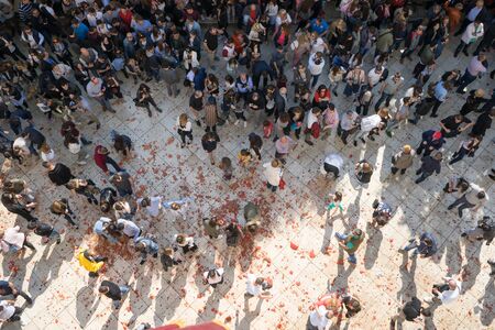 CORFU, GREECE - APRIL 15, 2017: At 11:00am on Holy Saturday, as is customary, Corfians throw jugs from balconies at the Liston Spaniada promenade on Holy Saturday, to celebrate the Resurrection.のeditorial素材