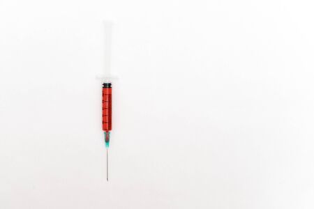 Medical colorful syringes isolated on white backgroundの写真素材