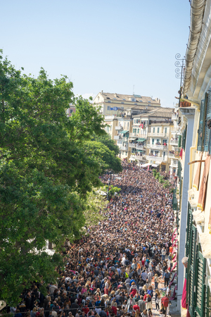 CORFU, GREECE - APRIL 15, 2017: At 11:00am on Holy Saturday, as is customary, Corfians throw jugs from balconies at the Liston Spaniada promenade on Holy Saturday, to celebrate the Resurrection.のeditorial素材