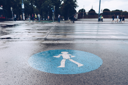JULY 2017, AUSTRIA, VIENNA: Pedestrian crossing the street , Vienna, Austriaのeditorial素材