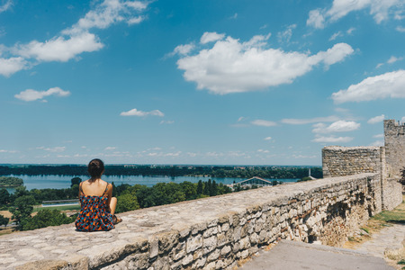 Girl look the view of Sava and Danube rivers, on Belgrade, Serbia.の写真素材