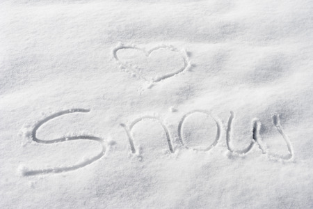 Love snow is written on the snowの写真素材