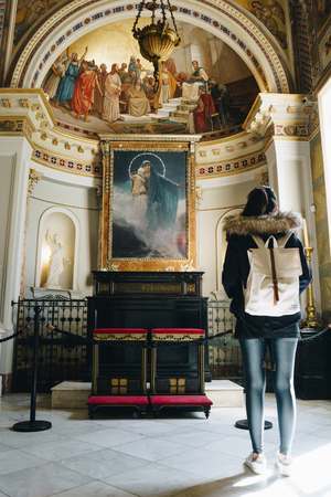 Tourist girl in chapel of  Achillion palace - Corfu, Greeceのeditorial素材
