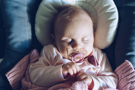 Close up of a baby girl while sleeping