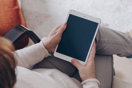 Senior woman using tabletの写真素材