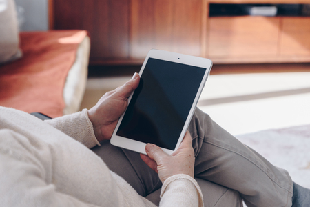 Senior woman using tabletの写真素材