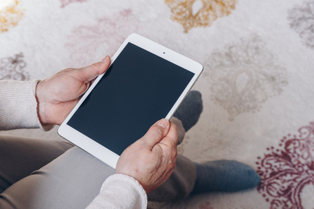 Senior woman using tabletの写真素材