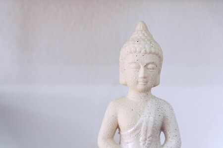 White Buddha isolated in white backgroundの写真素材