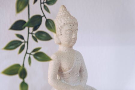 White Buddha isolated in white backgroundの写真素材