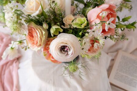 Still life with a beautiful bouquet of flowers and candlesの写真素材
