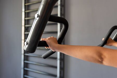 Young athletic woman exercising at the gym.の写真素材
